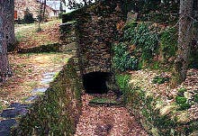 Entry of the aqueduct in the reservoir of the park - external view